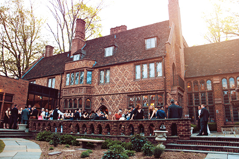 Guests enjoy the warm and sunny wearther on a fall day during cocktail hour at the Aldie Mansion