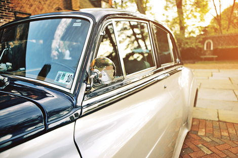 A vintage car is the preferred method of transportation for this bueatiful fall wedding