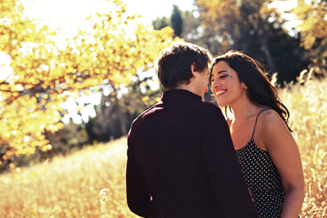This copule shares a moment on a beautiful, sunny fall day at the Tyler Arboretum for their engagement photos