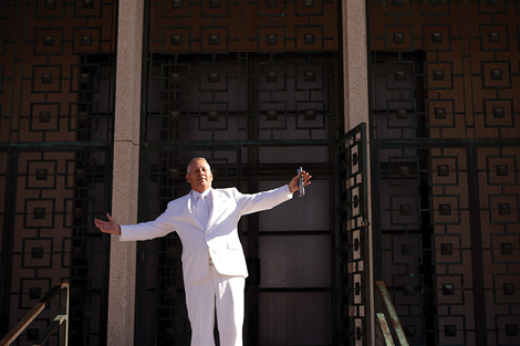 A guest looks excited after the wedding ceremony at a church in Los Angeles