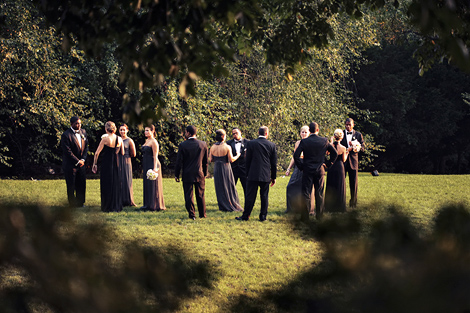 The bridal party gathers for portraits after the wedding ceremony