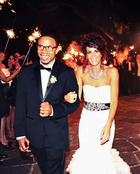 The bride and groom have a sparkler send off at their Greenville Country Club wedding