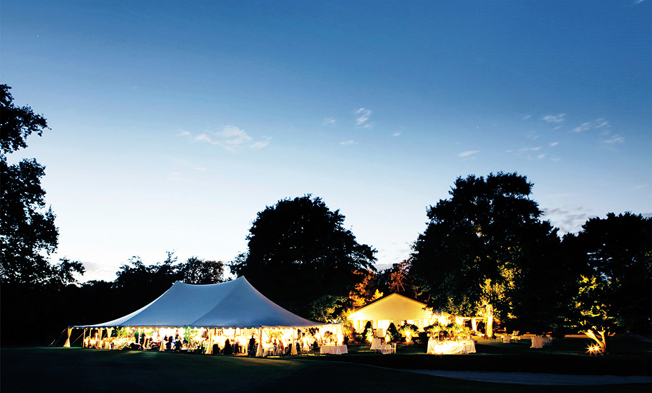 The tent and evening sky make for a perfect September wedding at the Moorestown Field Club in New Jersey, photographed by Peter Van Beever