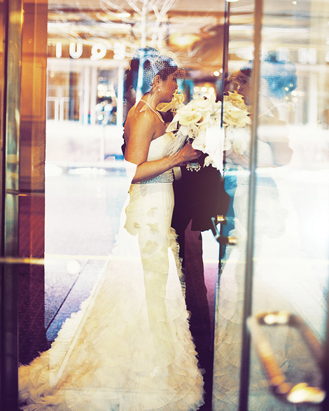 The bride leaves the hotel where she has been getting ready for her Boston wedding