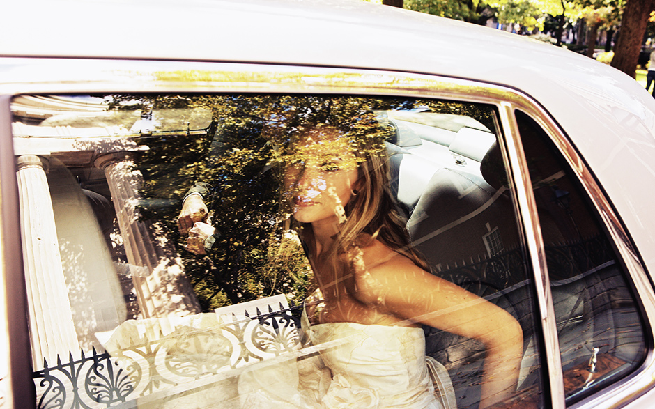 The bride sits in a Bentley on a summer day in Philadelphia, photographed by Peter Van Beever