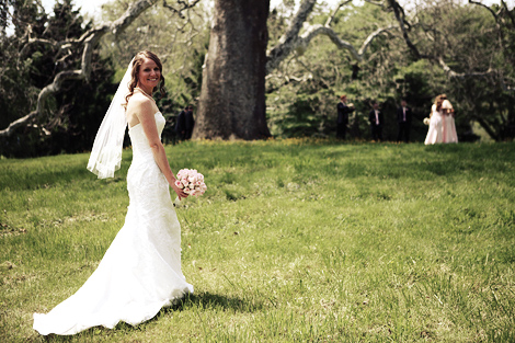 A bride poses for a shot at the Brandywine Battlefield in Pennsylvania after their wedding ceremony