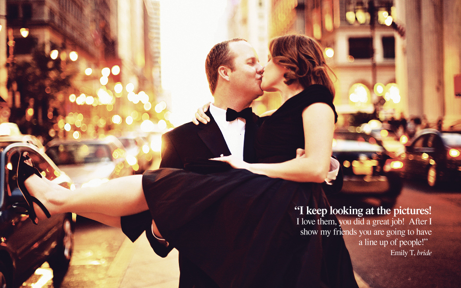 The groom holds the bride in his arms as they kiss in the middle of Broad Street in Philadelphia, PA for their out on the town engagement shoot