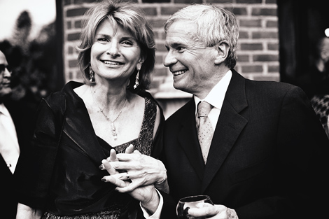 Guests enjoy a moment together during the cocktail party at the Aldie Mansion, following the outdoor wedding ceremony