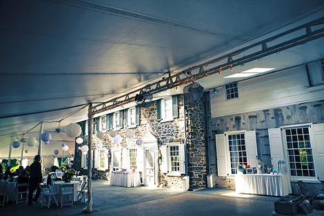 Appleford Estate makes for a simple and romantic location with a tent and purple and white lanterns