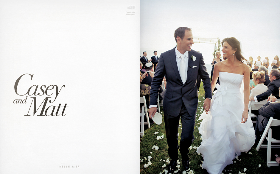 Bride and groom walk up the aisle at their beautiful outdoor summer wedding at the Belle Mer in Newport, Rhode Island, wedding photography by Peter Van Beever