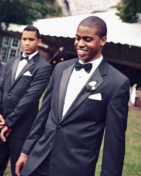 Groomsmen walk the grounds at Greenville Country Club before the ceremony