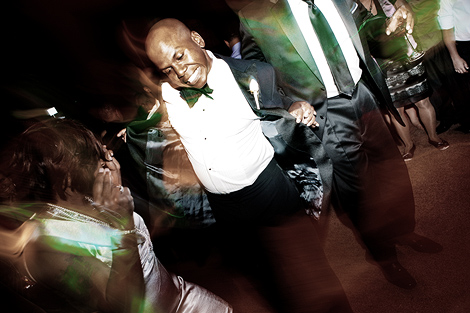 the groom dances and has a good time at his wedding reception at the Penn Museum of Anthropology in Philadelphia