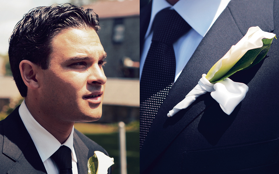 A groom waits to see his bride on their wedding day and shows off the beautiful boutinier in the Philadelphia area