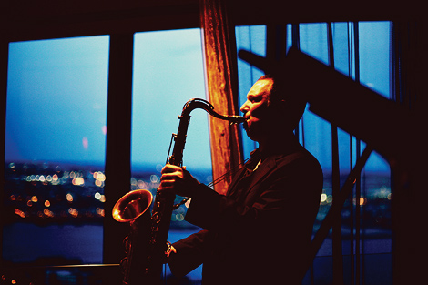 The band plays in front of the beautiful blue sky at this State Room wedding in Boston