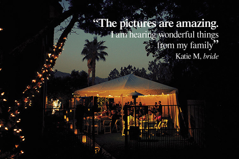 The tent where this Florida wedding reception is taking place, looks beautiful surrounded by palm trees decorated with lights