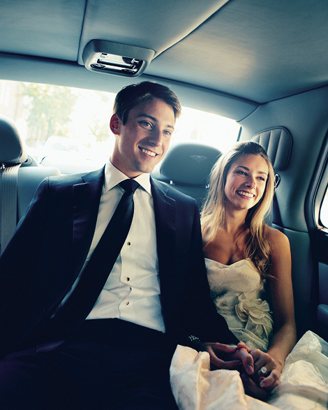 The bride and groom ride in a Bentley around Philadelphia before their wedding ceremony